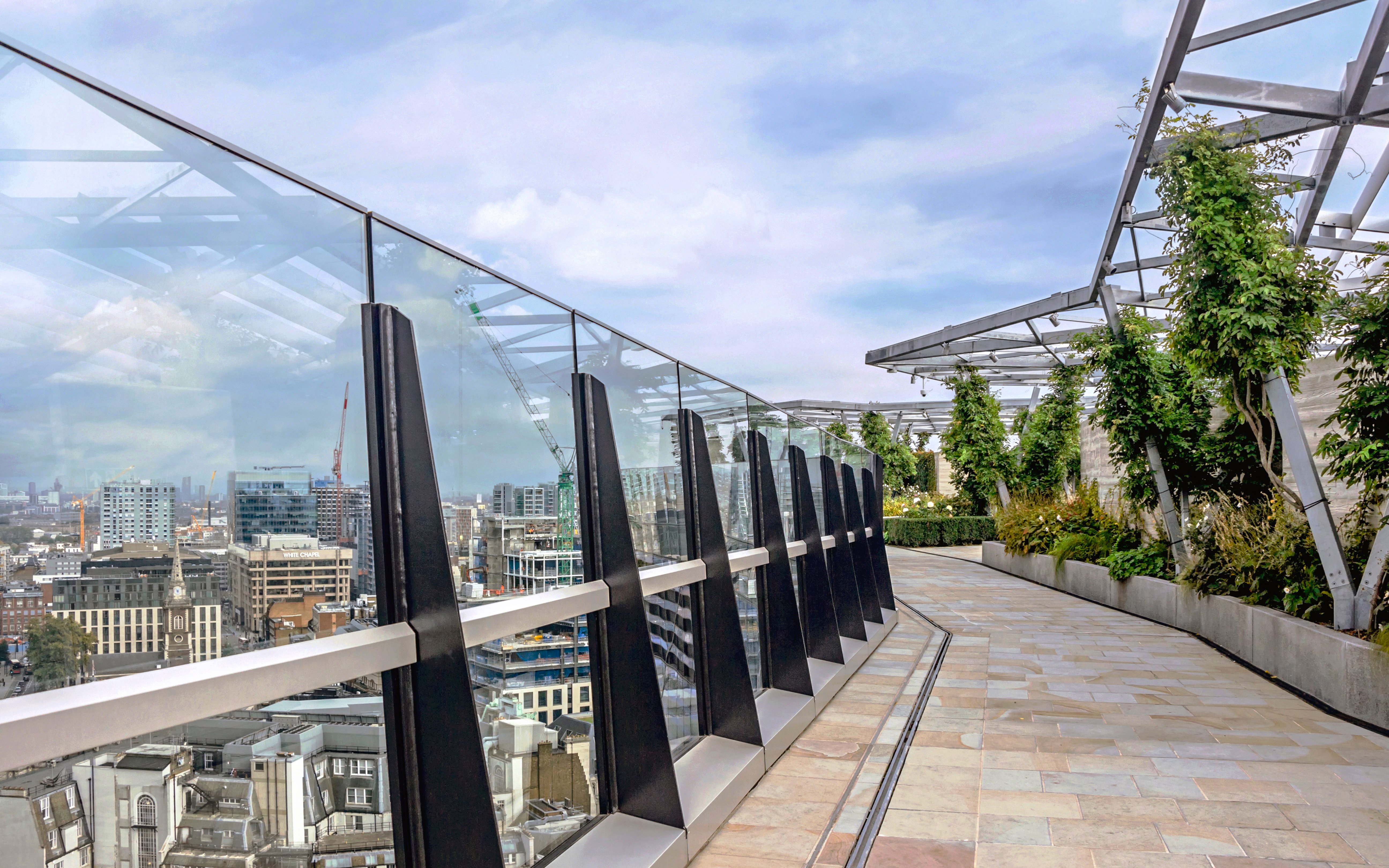 Sky Garden open terrace with city view and greenery in London.