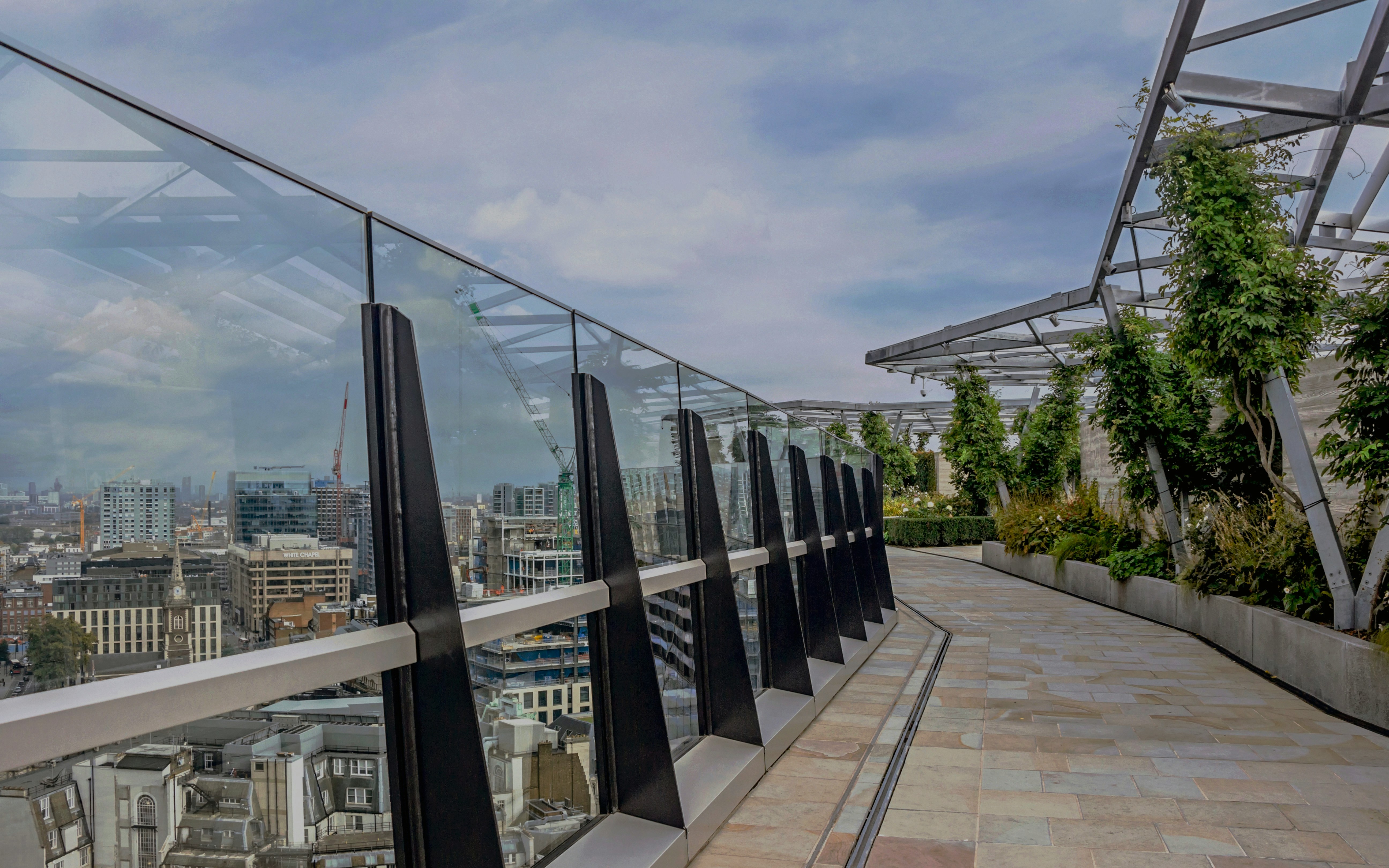 Sky Garden open terrace with city view and greenery in London.