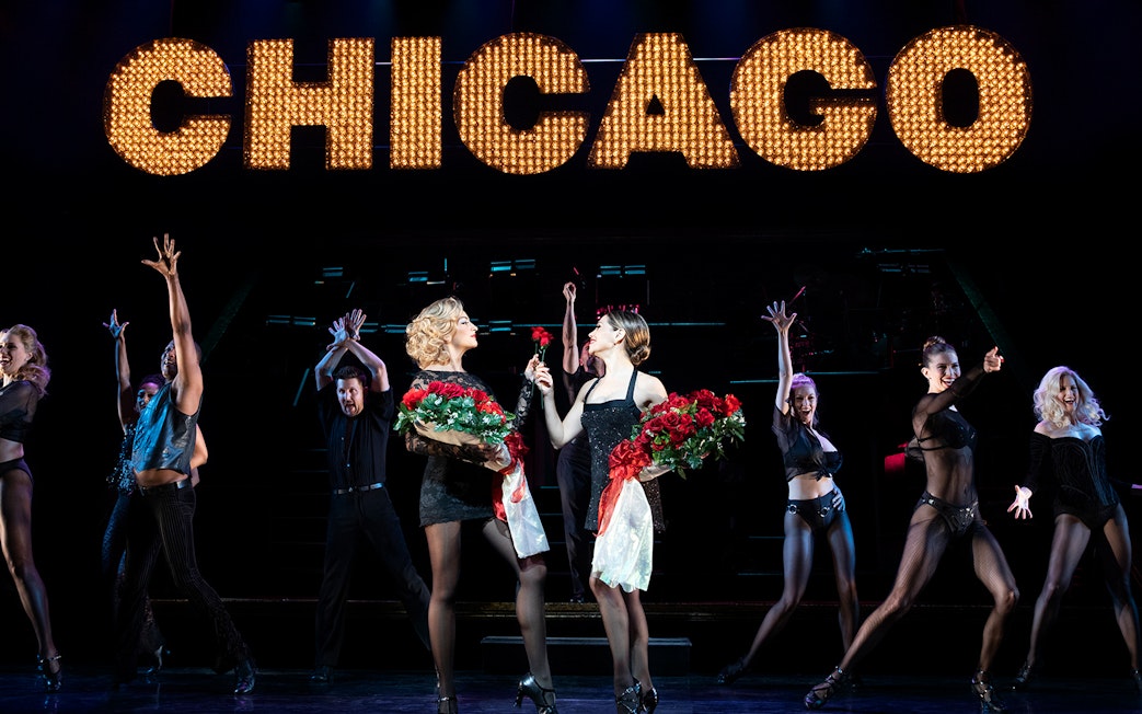 Performers on stage during a Chicago musical show.