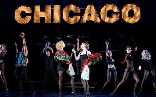 Performers on stage during a Chicago musical show.
