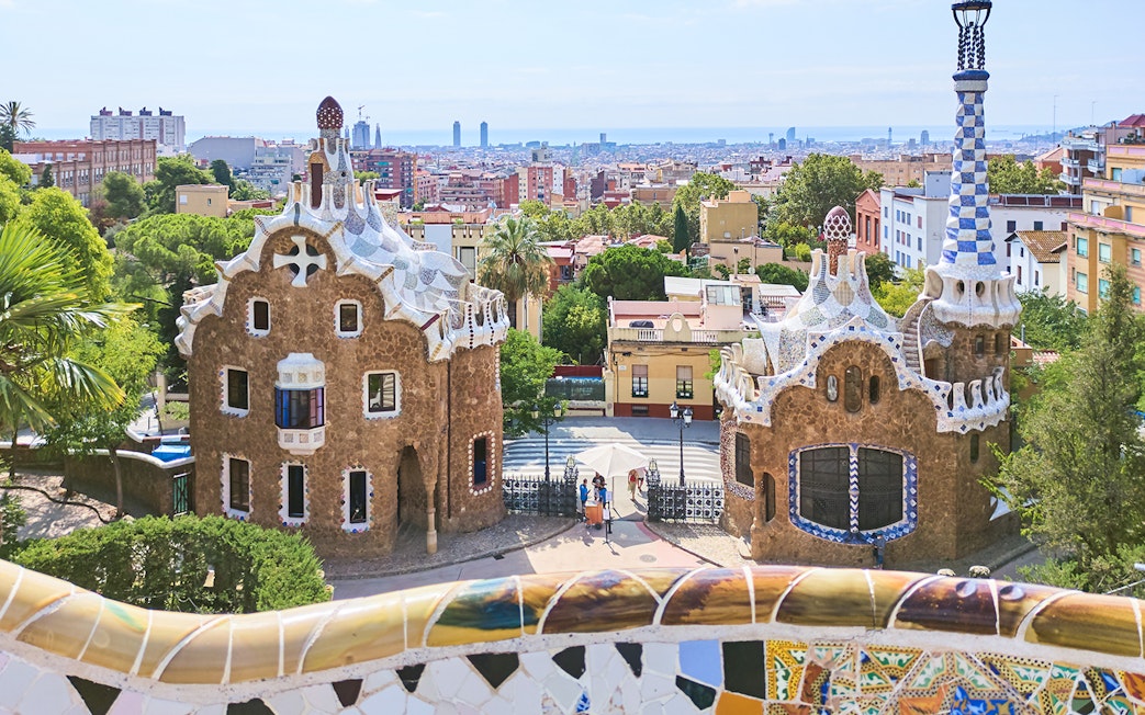 Park Güell entrance with mosaic buildings in Barcelona, Spain.