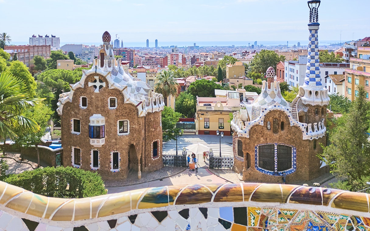 Park Güell entrance with mosaic buildings in Barcelona, Spain.
