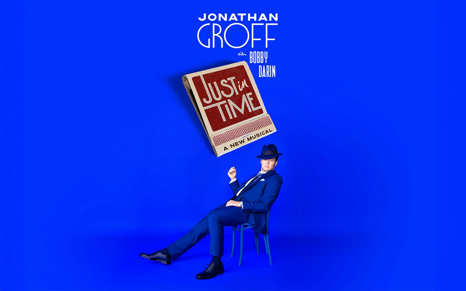 Just In Time musical poster with a person in a blue suit and hat.