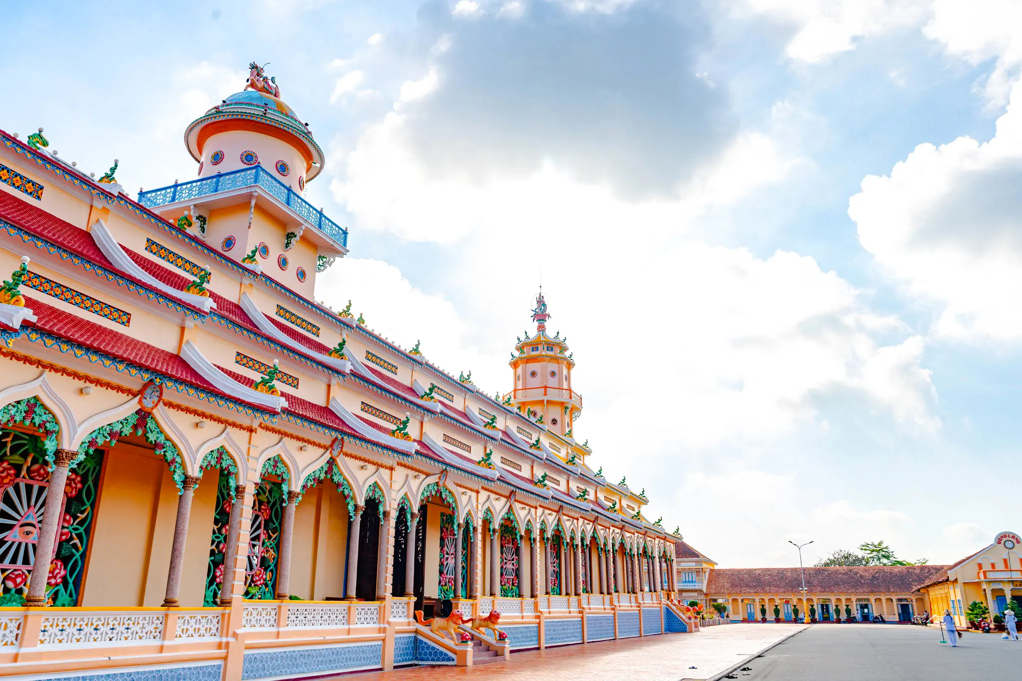 Cao Dai Temple exterior with ornate architecture, Ho Chi Minh City tour.
