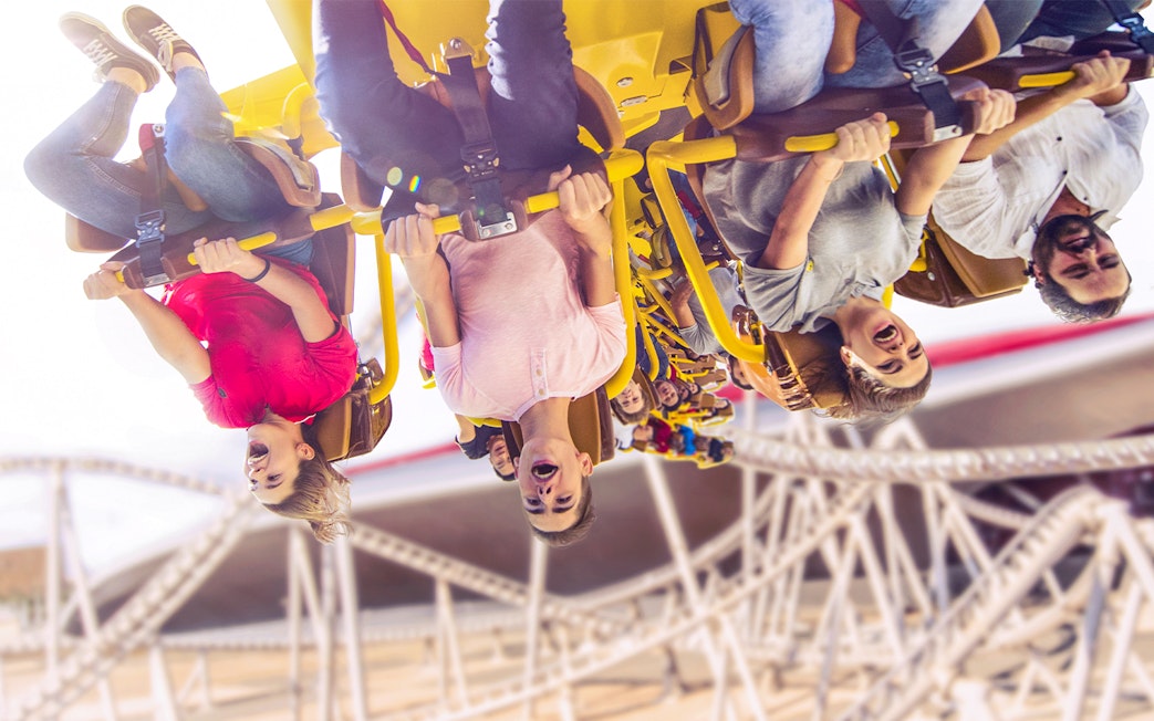 People enjoying Flying Aces ride at Ferrari World, Abu Dhabi.