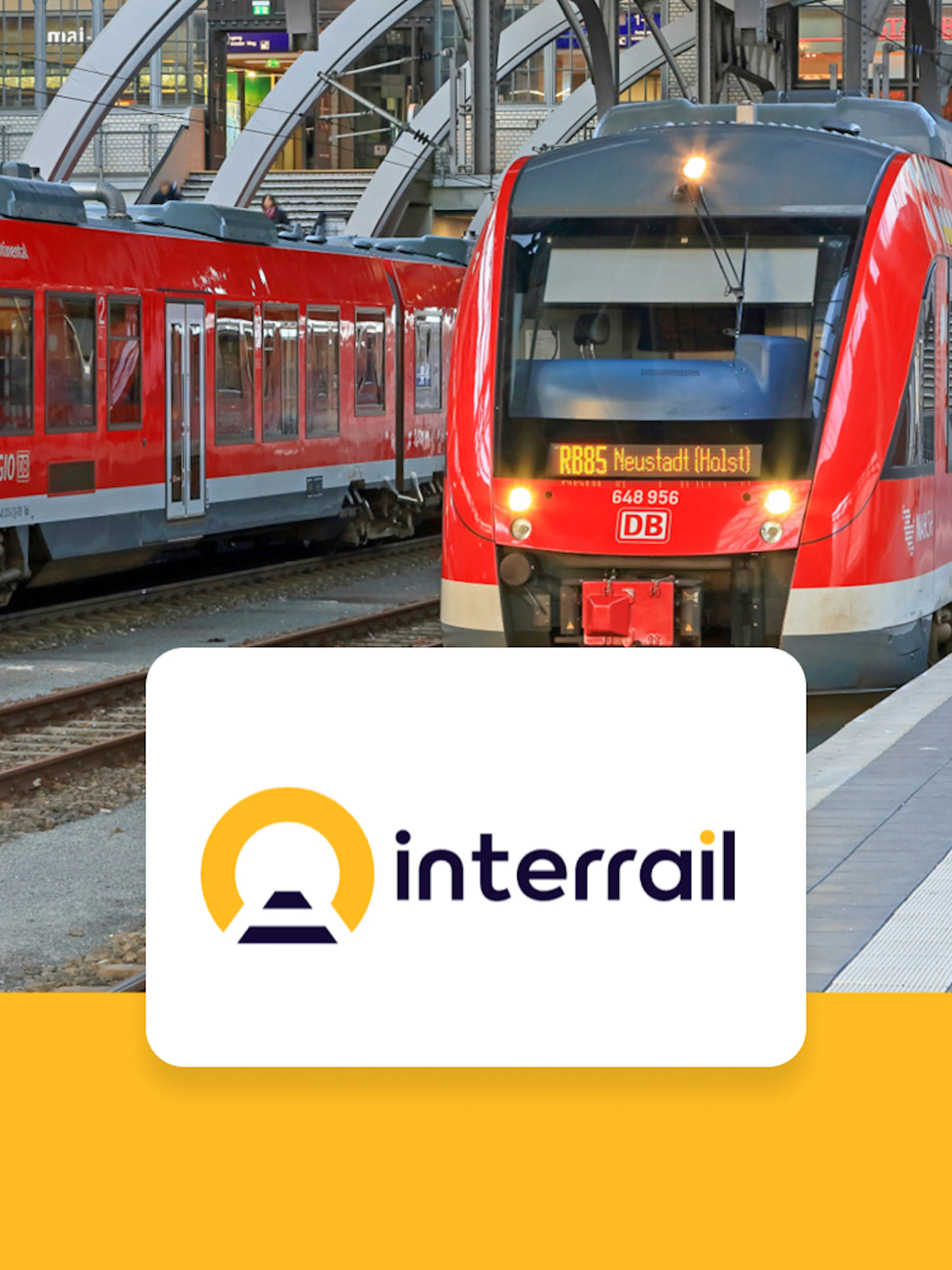 Interrail train at German station platform with Interrail logo.
