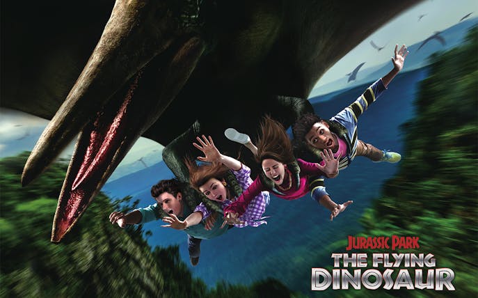 Riders on The Flying Dinosaur roller coaster at Jurassic Park USJ.