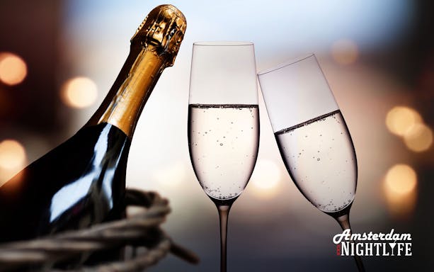 Champagne bottle and glasses for Amsterdam nightlife cruise experience.