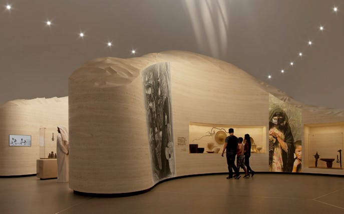 Visitors exploring exhibits at Zayed National Museum, Abu Dhabi.