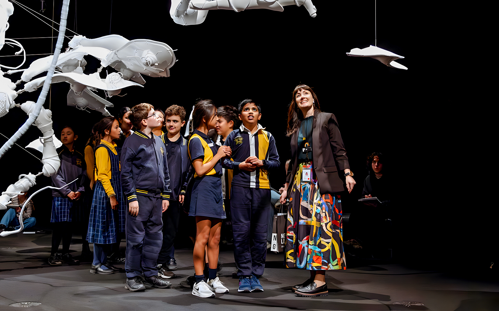 School children observing art installation at National Gallery of Victoria.