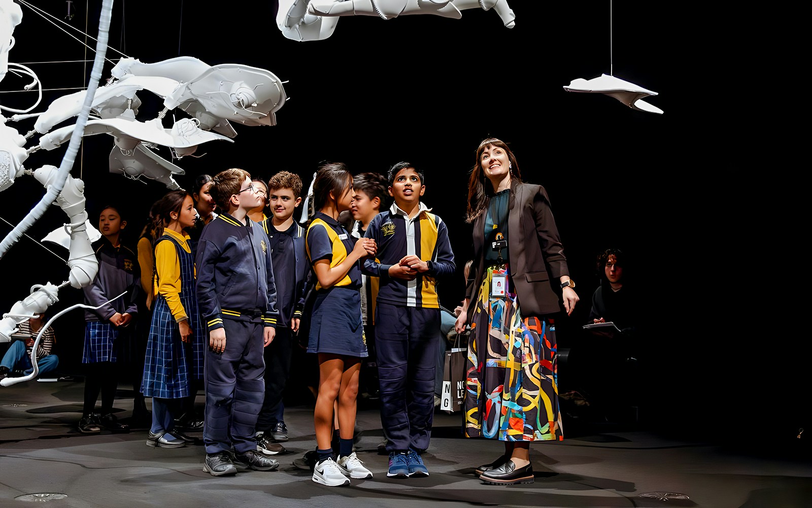 School children observing art installation at National Gallery of Victoria.
