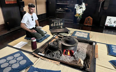 Traditional Japanese hearth in Shirakawa-go house during Kanazawa day tour.