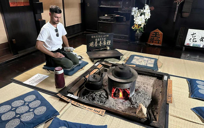 Traditional Japanese hearth in Shirakawa-go house during Kanazawa day tour.