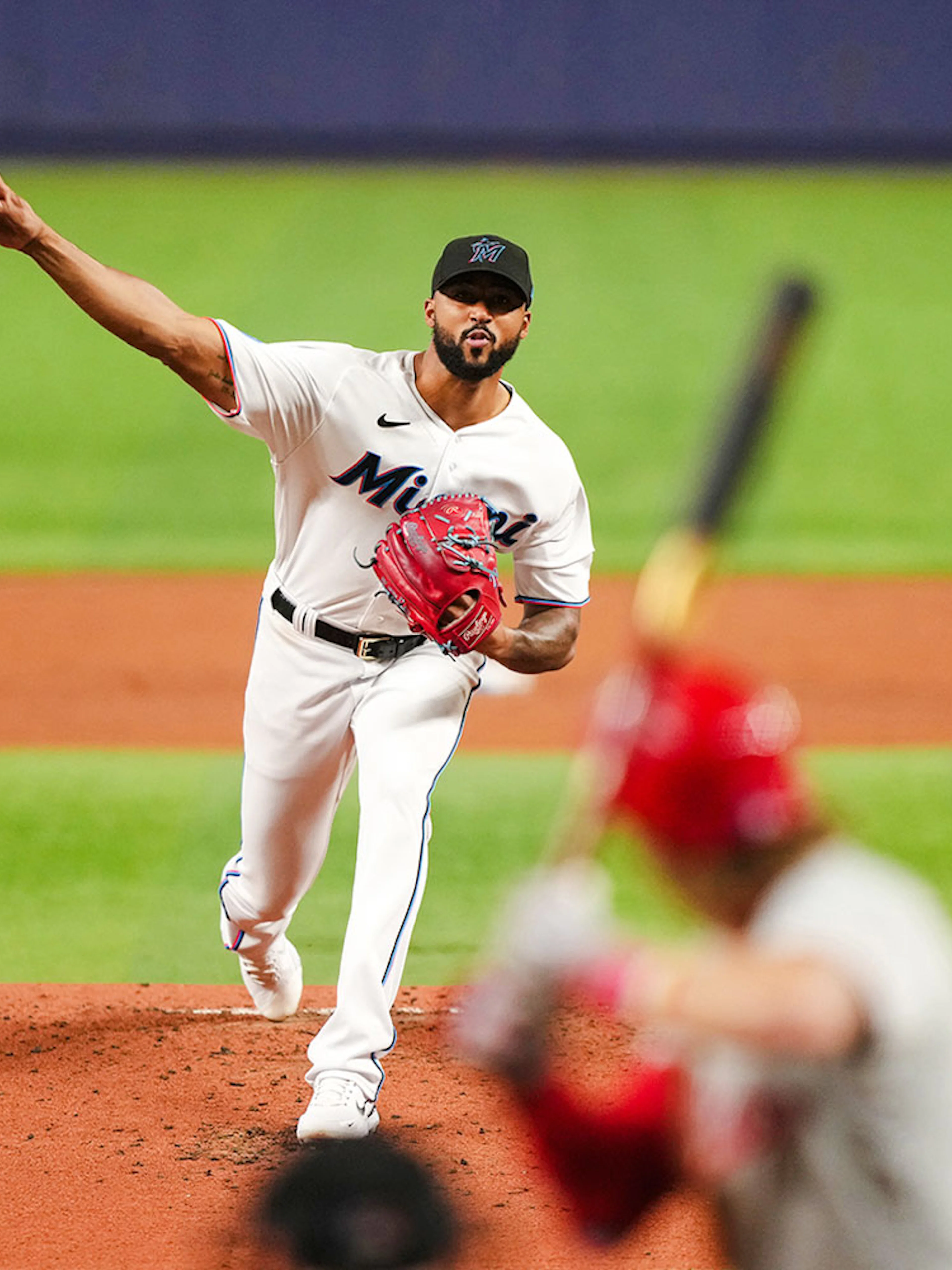 Pitcher throwing a baseball during a Miami Marlins game.