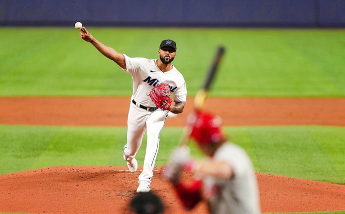 Pitcher throwing a baseball during a Miami Marlins game.