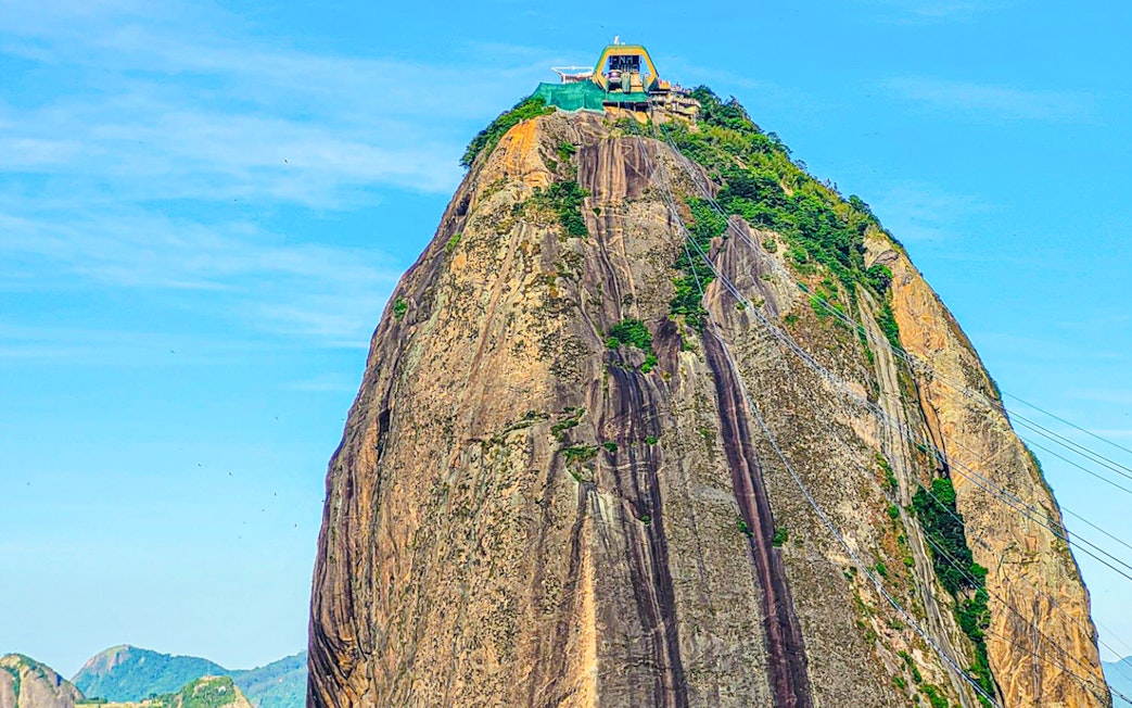 Sugarloaf Mountain peak with cable car station, Rio de Janeiro.