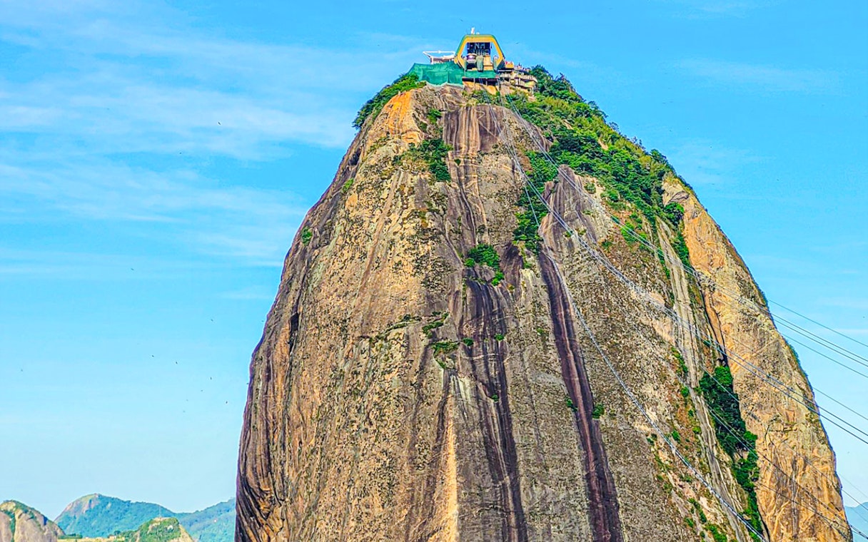 Sugarloaf Mountain peak with cable car station, Rio de Janeiro.