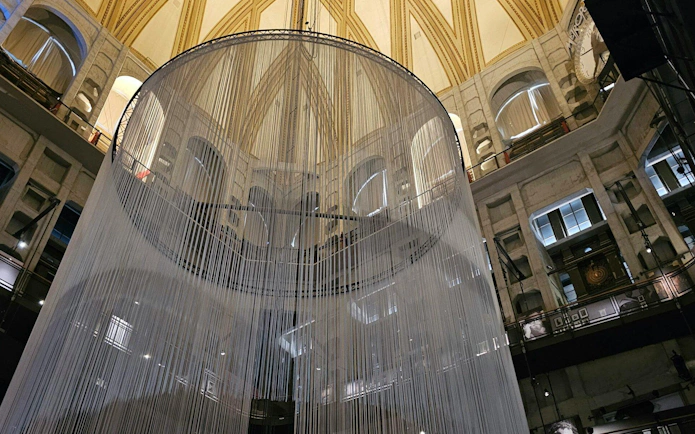 Interior view of the National Museum of Cinema in Turin with architectural details and hanging installation.