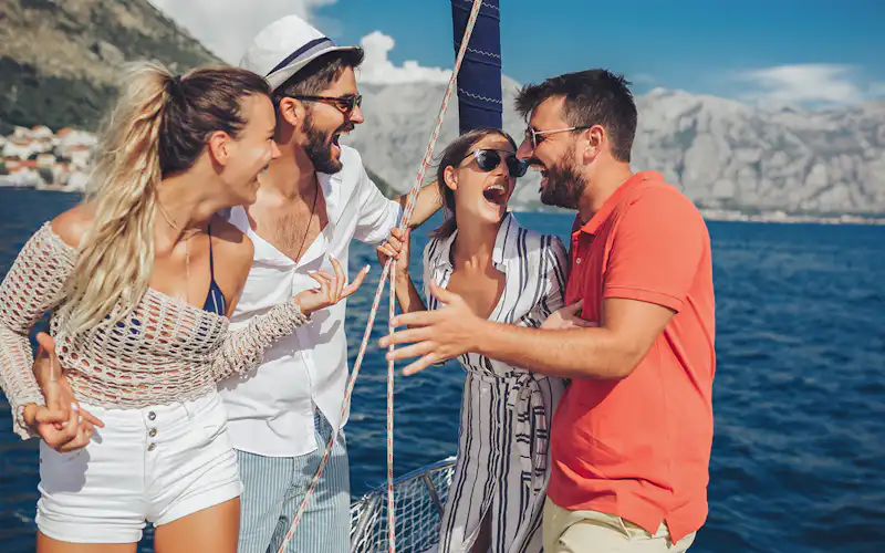 people on boat at amalfi