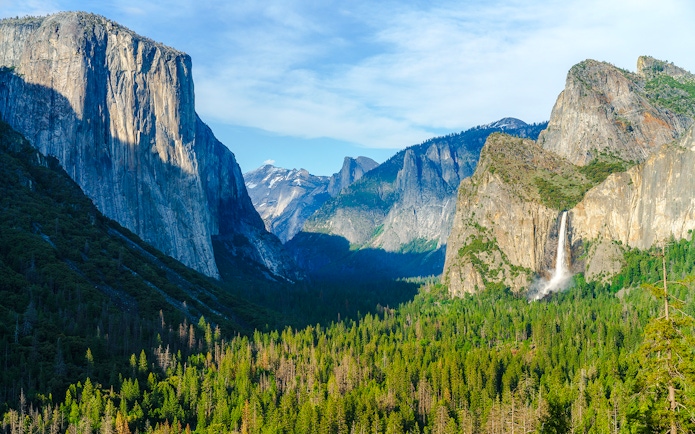 Yosemite's Tunnel View with El Capitan and Bridalveil Fall in the background.