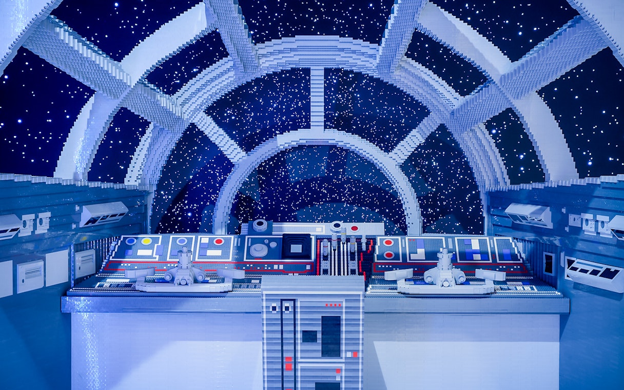 Millennium Falcon cockpit made of LEGO at Star Wars exhibition.