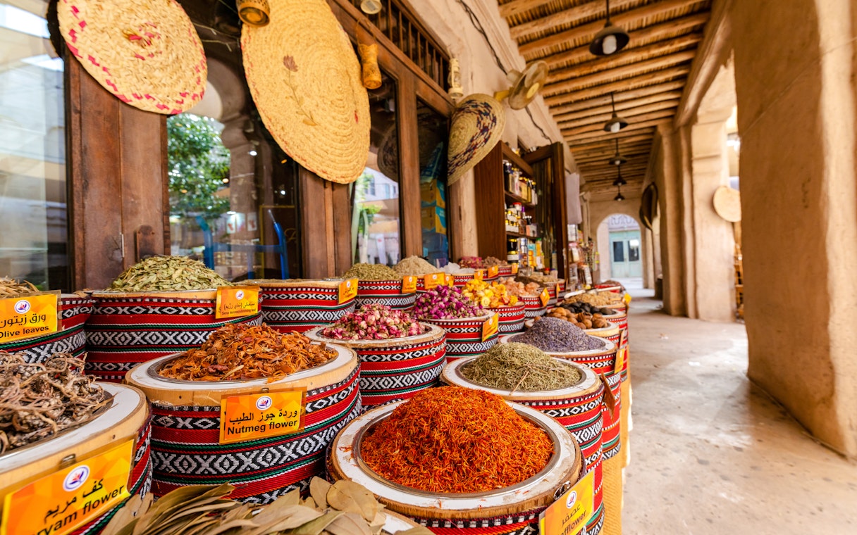 Fragrances and spices displayed in baskets at Spice Souk, Dubai.