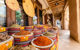 Fragrances and spices displayed in baskets at Spice Souk, Dubai.