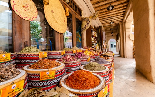 Fragrances and spices displayed in baskets at Spice Souk, Dubai.