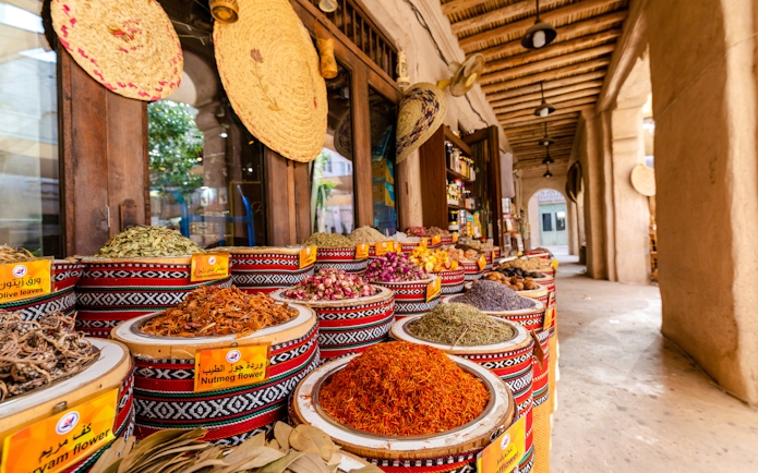 Fragrances and spices displayed in baskets at Spice Souk, Dubai.