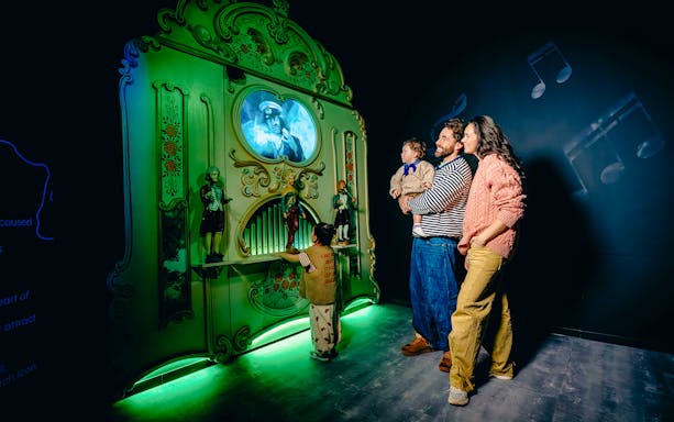 Guests enjoying interactive exhibit on Highlights of Holland tour.