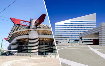 San Siro Stadium with red roof structures in Milan, Italy, next to modern building.