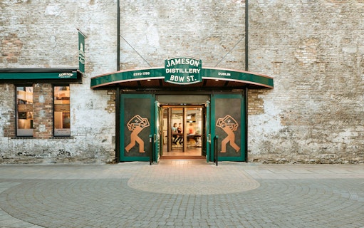 Jameson Distillery Bow St. entrance in Dublin with visitors entering for a guided tour.