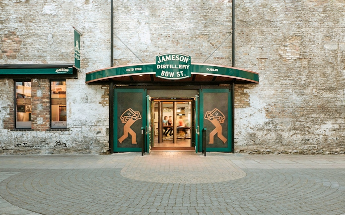 Jameson Distillery Bow St. entrance in Dublin with visitors entering for a guided tour.