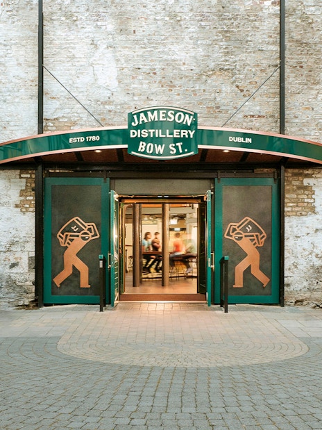 Jameson Distillery Bow St. entrance in Dublin with visitors entering for a guided tour.