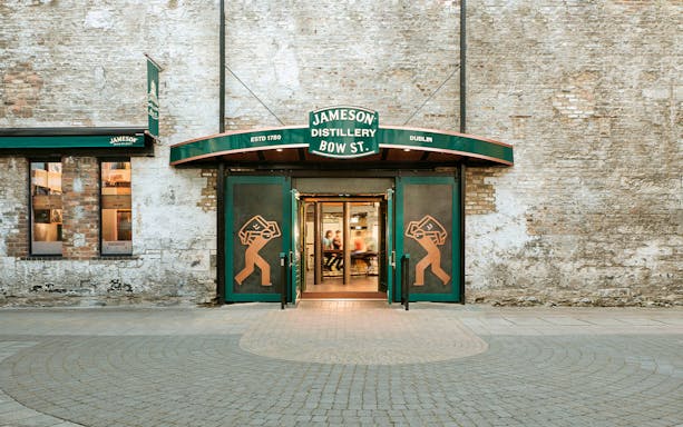 Jameson Distillery Bow St. entrance in Dublin with visitors entering for a guided tour.