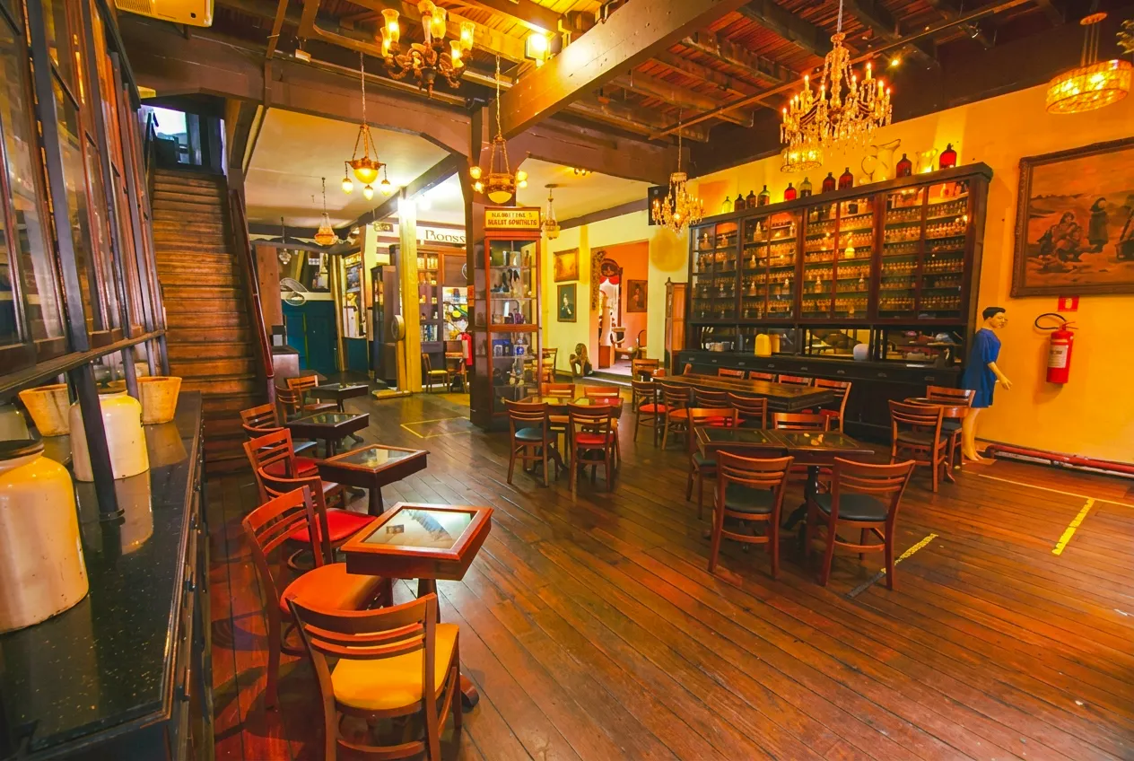 Rio Scenarium interior with vintage decor and dining area, Rio de Janeiro.
