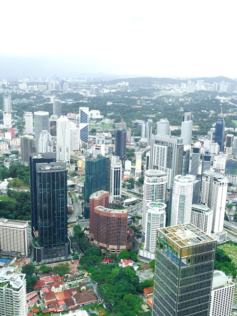 View of Kuala Lumpur skyline from Petronas Twin Towers observation deck.