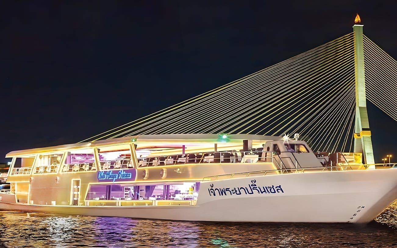 Chao Phraya Princess Cruise at night near Rama VIII Bridge, Bangkok.
