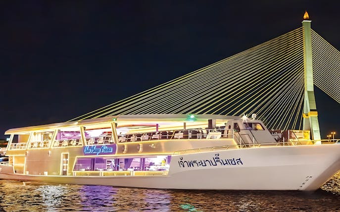 Chao Phraya Princess Cruise at night near Rama VIII Bridge, Bangkok.