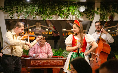 Musicians performing during Budapest Dinner Cruise with Folklore Show.