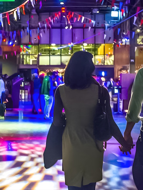Couple exploring interactive exhibits at the Exploratorium in San Francisco.