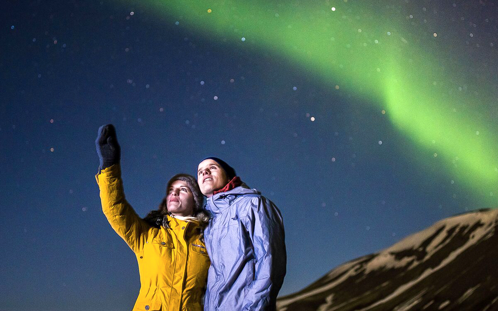 Guests viewing northern lights on Premium Northern Lights Super Jeep Tour.