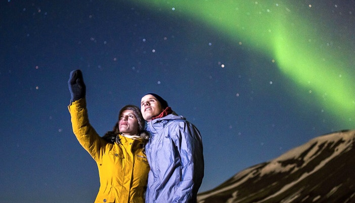 Guests viewing northern lights on Premium Northern Lights Super Jeep Tour.