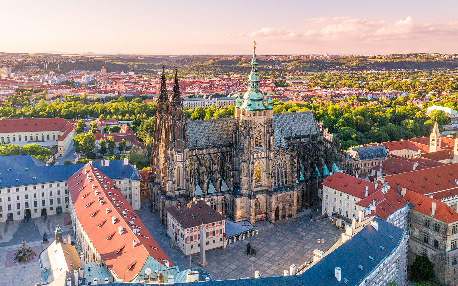 Tourists exploring Prague Castle on a guided tour in Prague, Czech Republic.