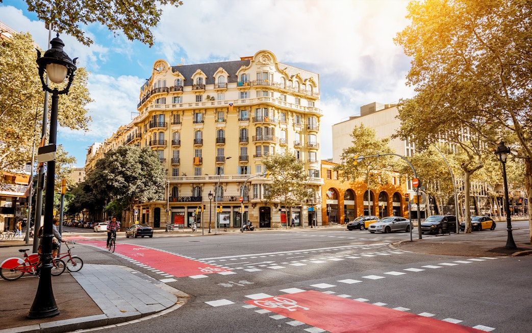 Tourists exploring Barcelona street near the Picasso Museum on a walking tour.