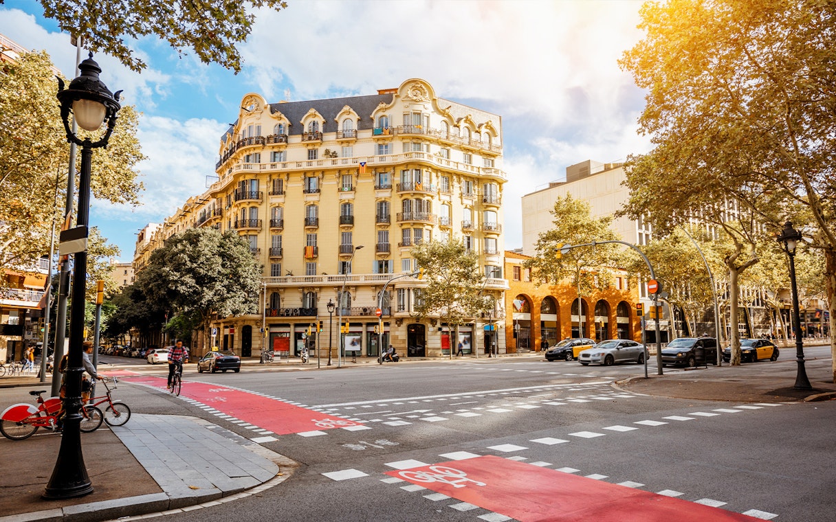 Tourists exploring Barcelona street near the Picasso Museum on a walking tour.