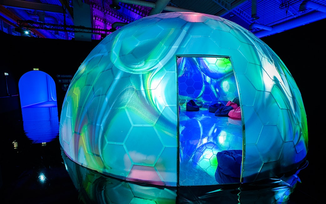 Geodesic dome with colorful lights at Bubble Planet, Washington DC.