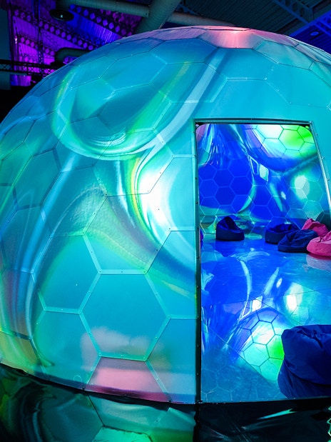 Geodesic dome with colorful lights at Bubble Planet, Washington DC.