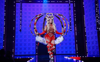 Performer on stage at RuPaul's Drag Race LIVE! Vegas show with elaborate costume.