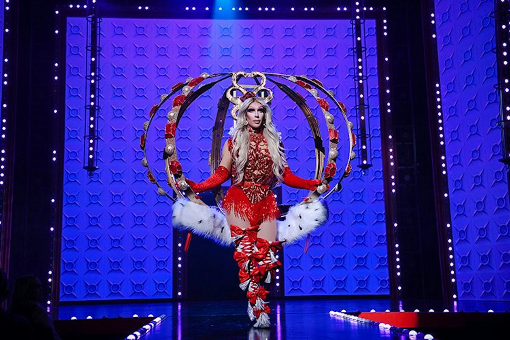 Performer on stage at RuPaul's Drag Race LIVE! Vegas show with elaborate costume.
